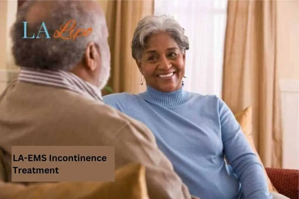 Couple sat smiling at each other - LA-EMS treatment Maidenhead