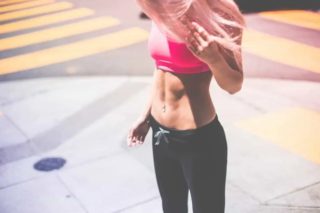 Woman with toned stomach after LA-EMS Body Sculpting Treatment Maidenhead
