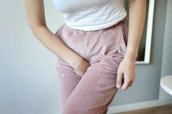 woman running for the toilet because of urinary incontinence Maidenhead